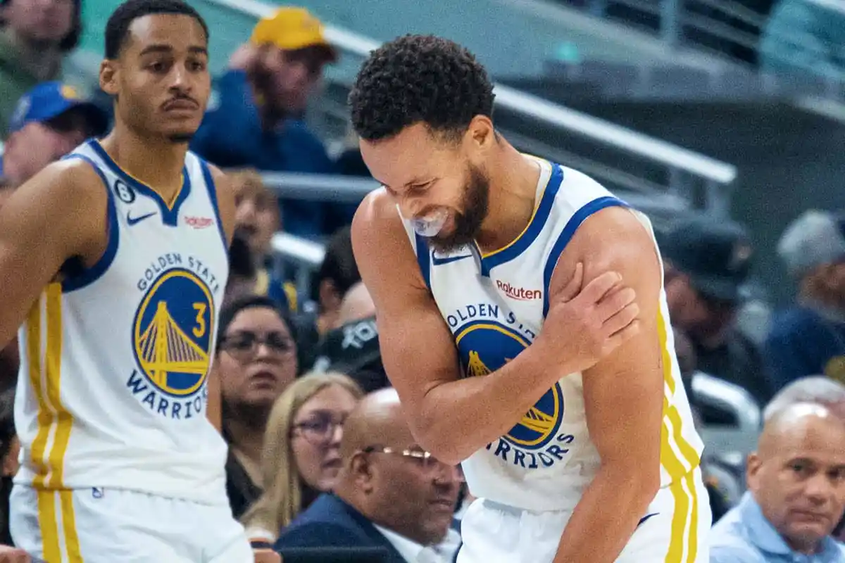 Stephen Curry deve perder alguns jogos por les&atilde;o no ombro