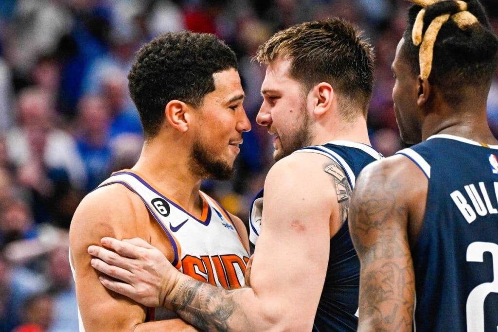 Treta natalina? Luka Doncic e Devin Booker se reencontram ap&oacute;s provoca&ccedil;&otilde;es